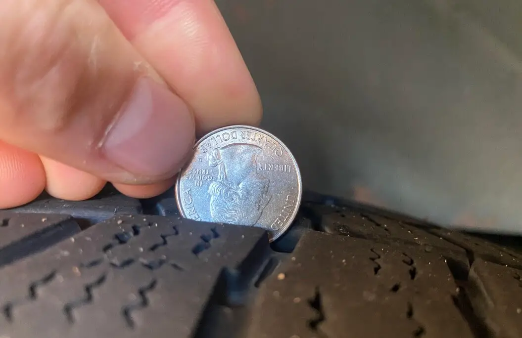 how to check tire tread with a quarter