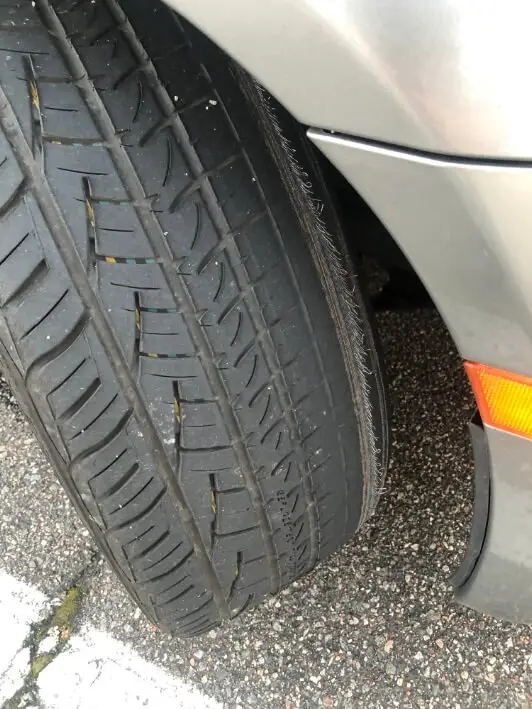 wire showing on tire